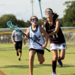 girl playing lacrosse